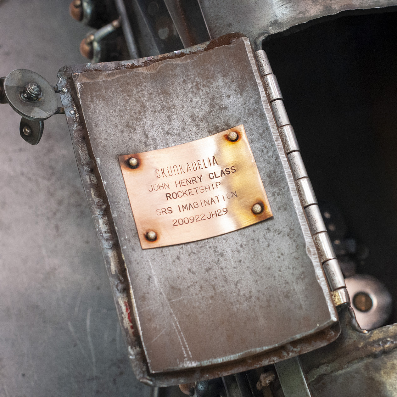 copper plaque on the inside of the rocket hatch
